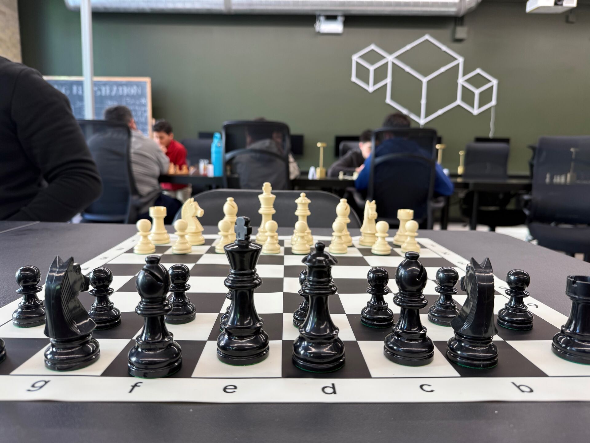 Chess board with pieces set up for a game